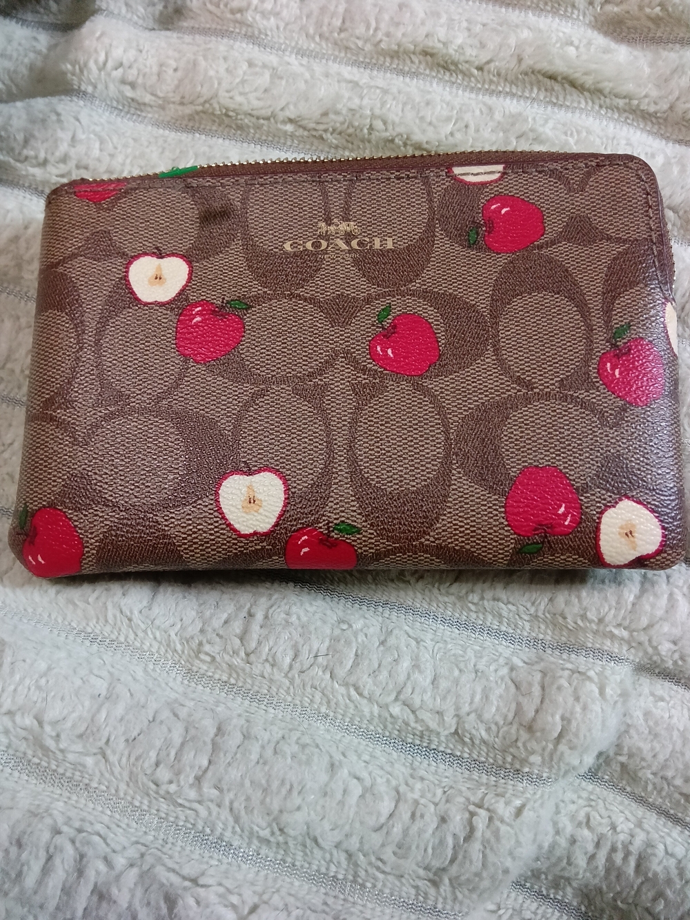 Coach Brown Signature Canvas Clutch with Red Apple Print